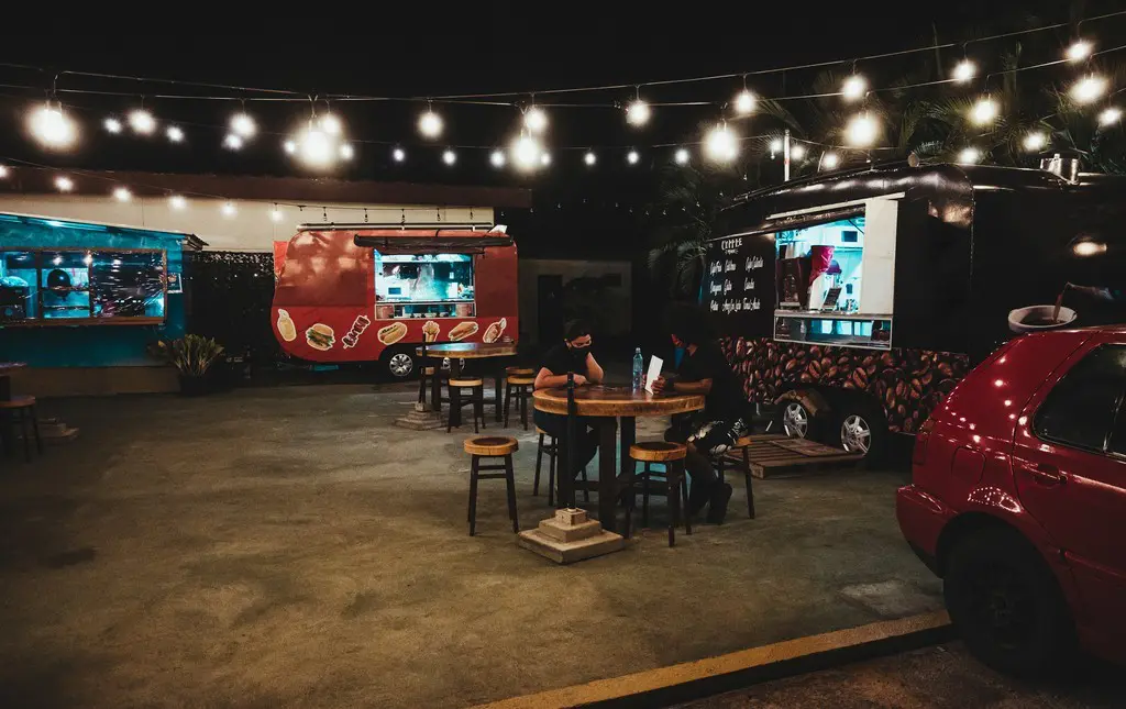 Food trucks set up for a school fundraiser.