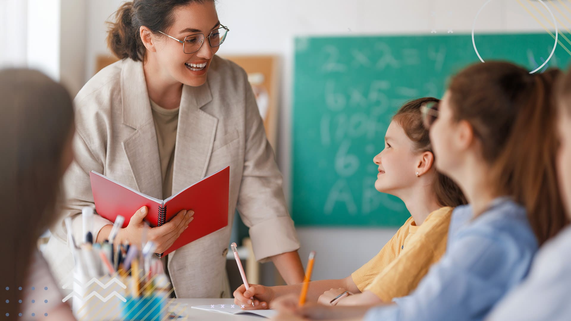 Teacher laughing with group of female students