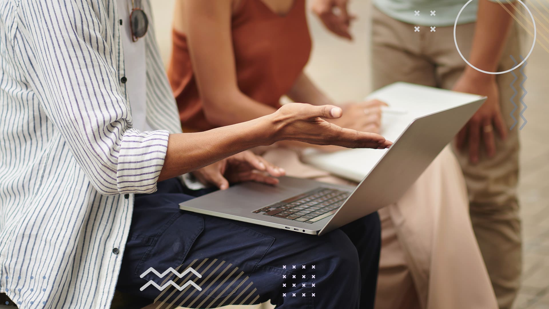 Woman sitting with laptop on her lap