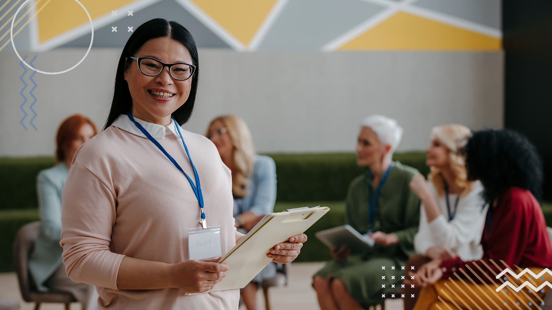 PTA Volunteer smiling while leading a meeting